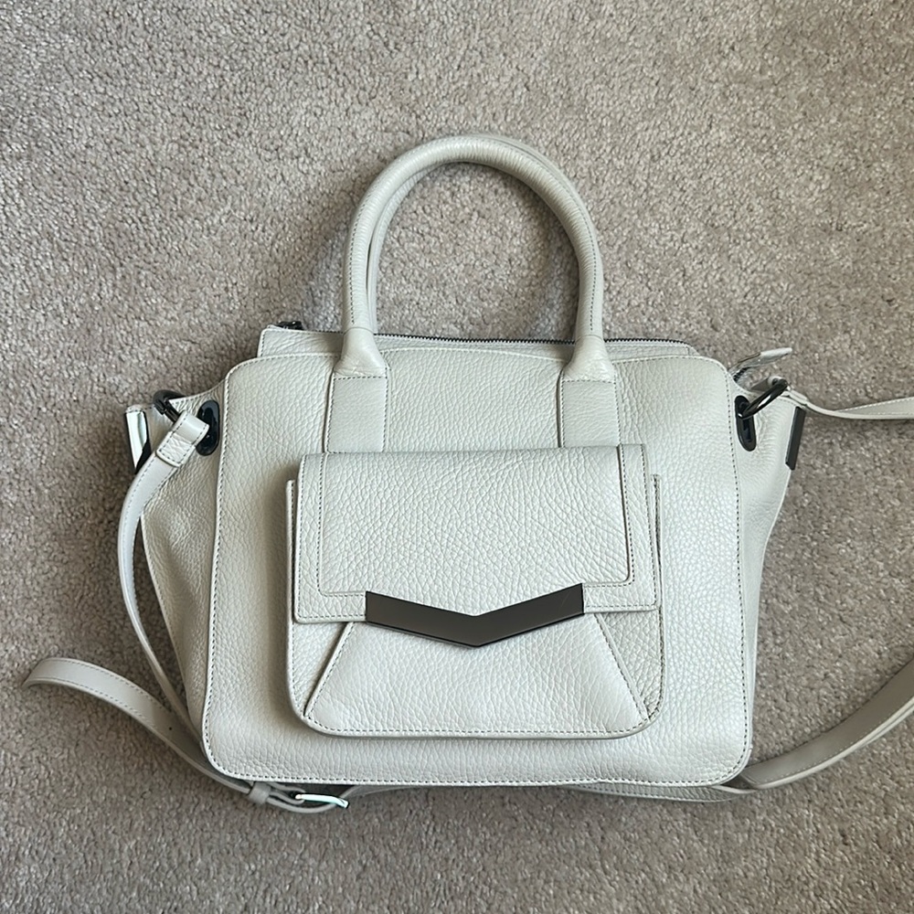 Times arrow leather handbag